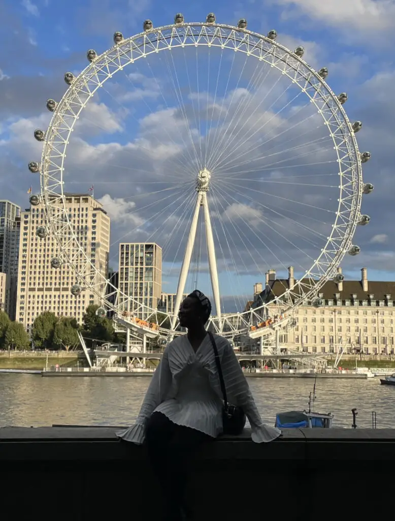 Gophari sitting in London with the London Eye in the background